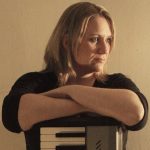 Pianist and composer Vicky Clubb with her piano